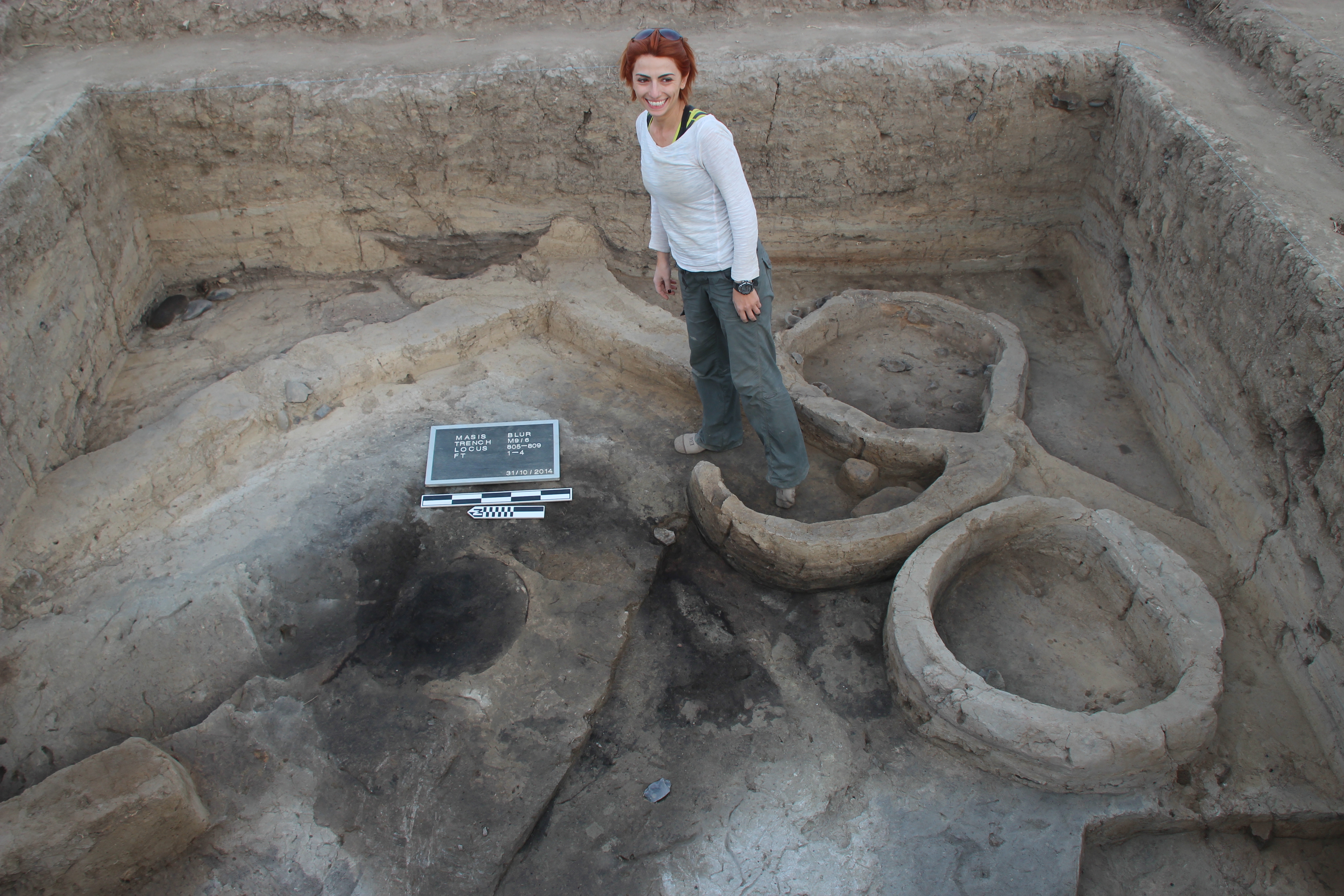 Dr. Martirosyan-Olshansky in a trench